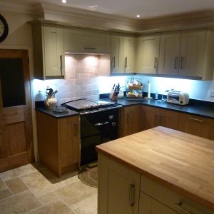 Broadoak-natural-and-painted-wall-units-and-stove