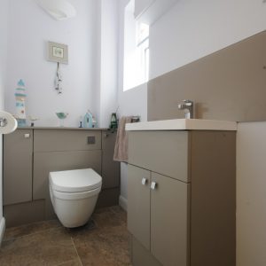Cloakroom-with-Mereway-Fitted-Furniture-in-Adriatic-Pumice